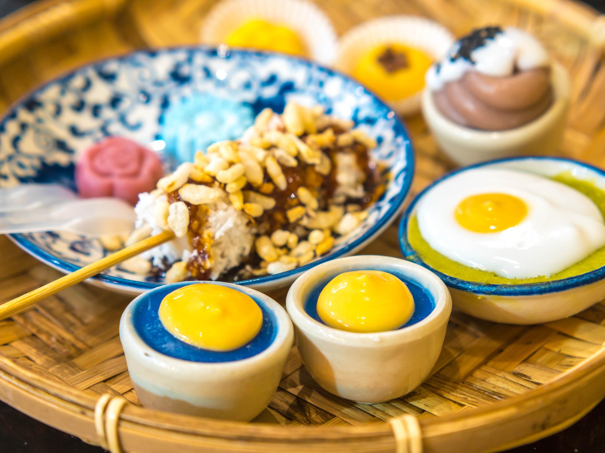 大巨蛋開出兩朵台味牡丹——但這場盛宴,是給誰準備的? — 美食文章主圖，由時代熱搜蘇曉曼撰寫